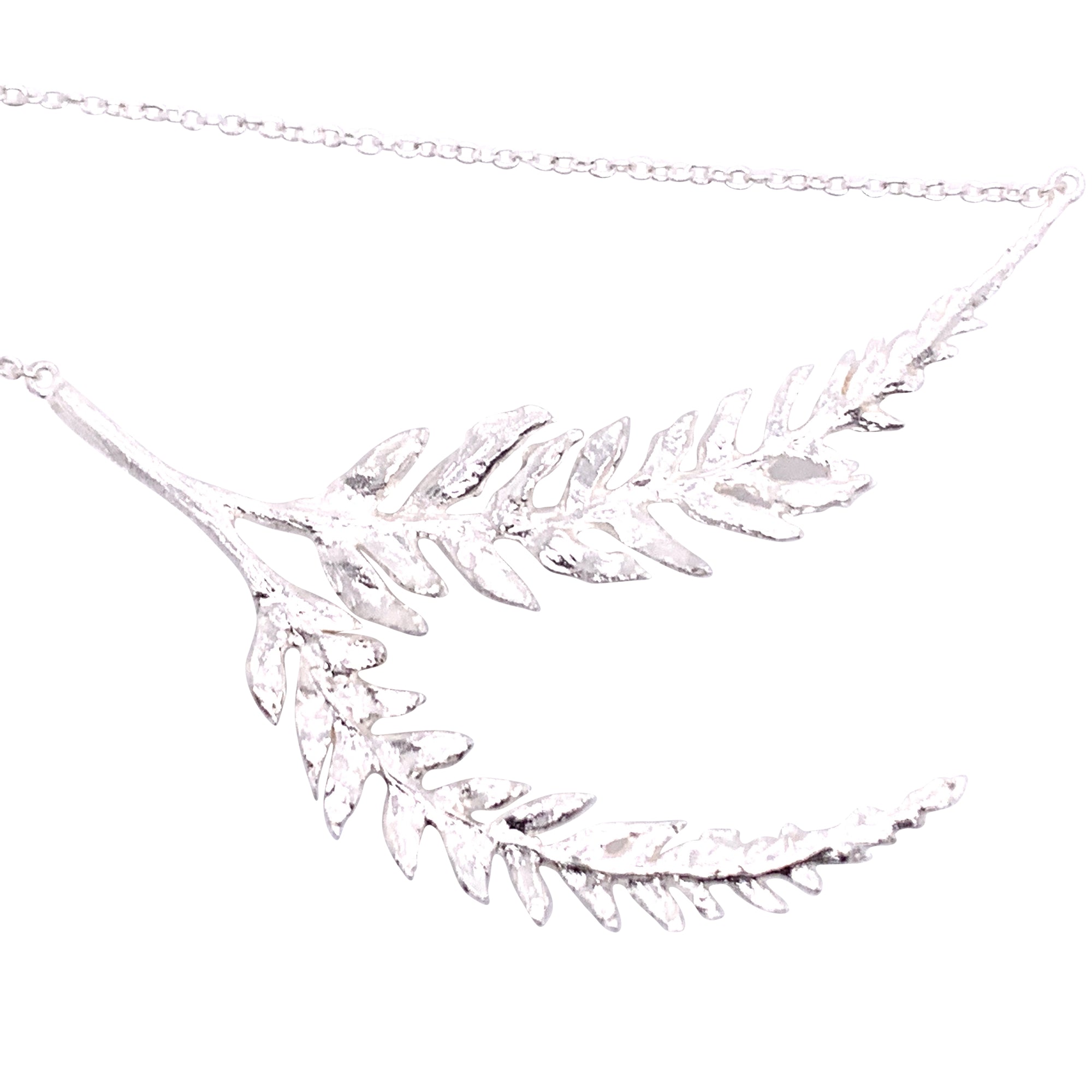 Textured silver necklace made with real leaves.