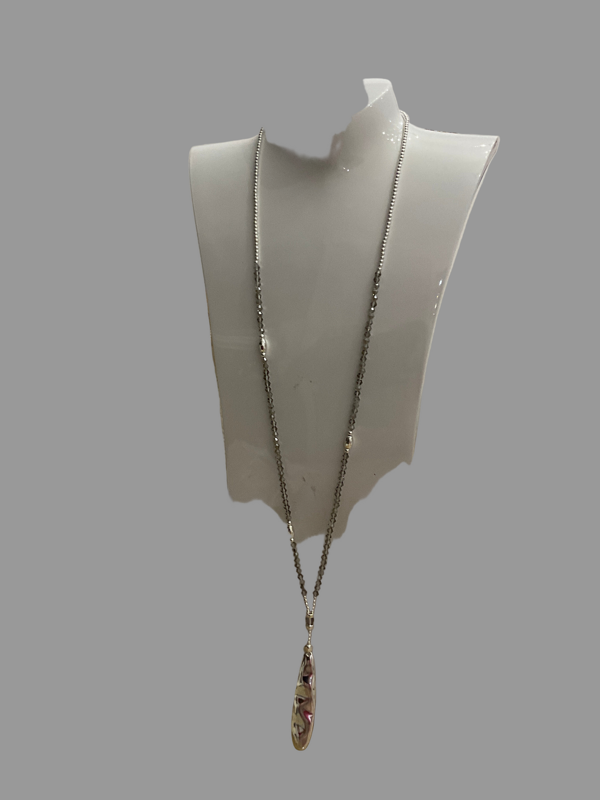 Fashion Jewellery Necklace with Smokey Beads and a long focal piece.
