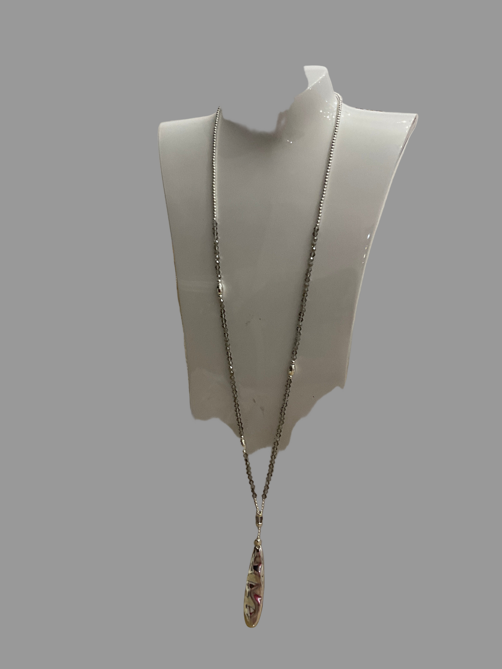 Fashion Jewellery Necklace with Smokey Beads and a long focal piece.