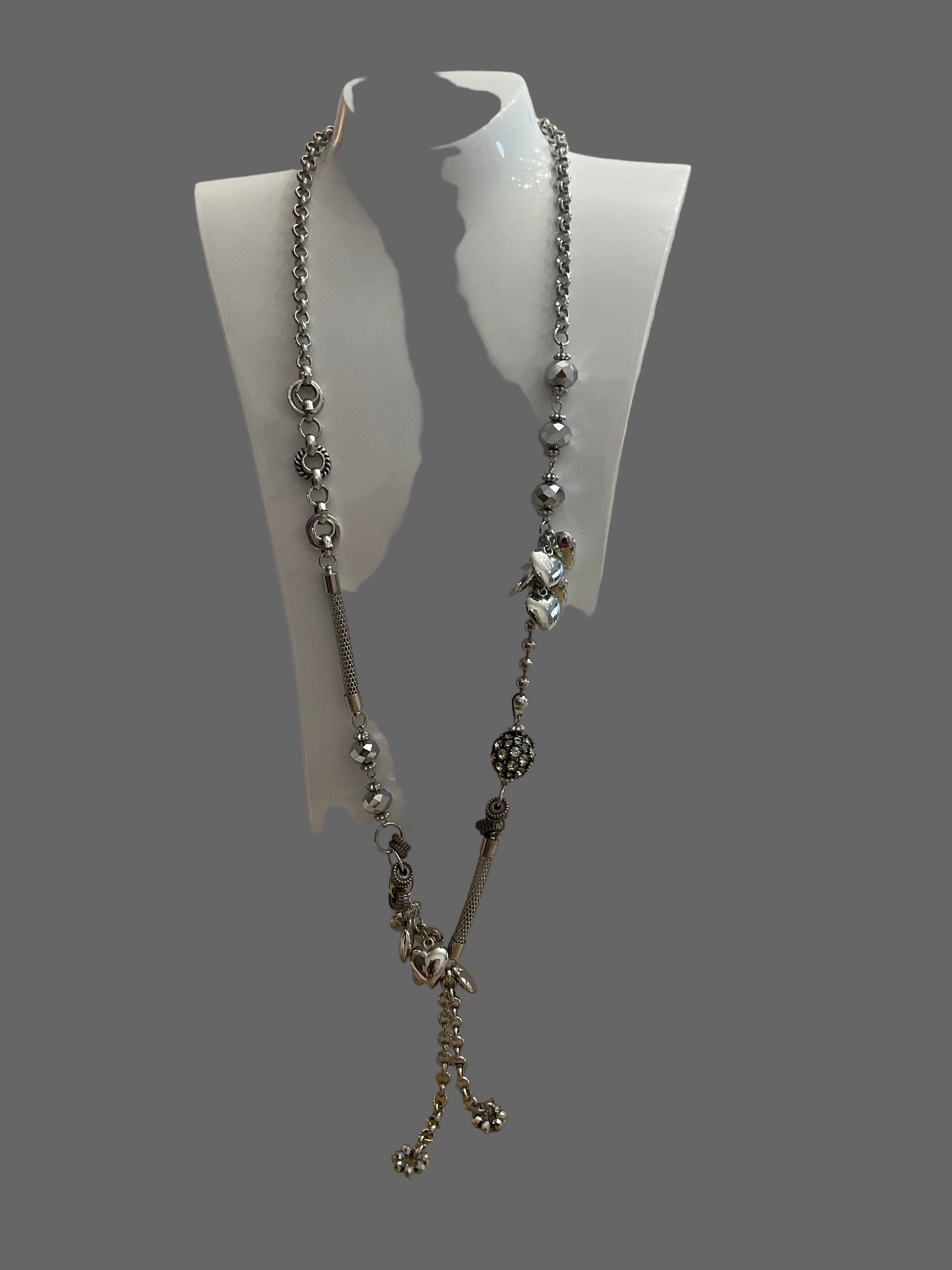 Fashion Jewellery Silver Coloured Necklace covered in hearts.