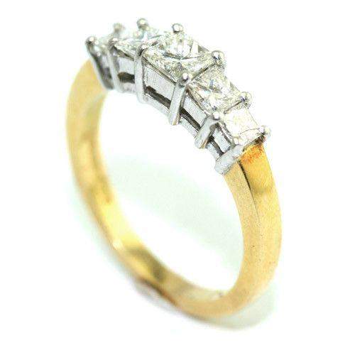 Gold ring with five squarecut diamonds in a sleek setting