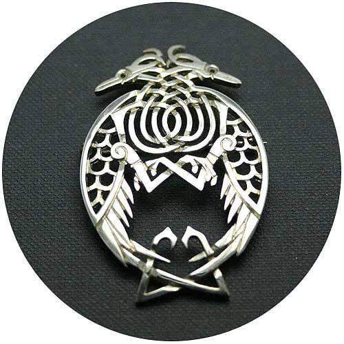 Silver celtic brooch sales