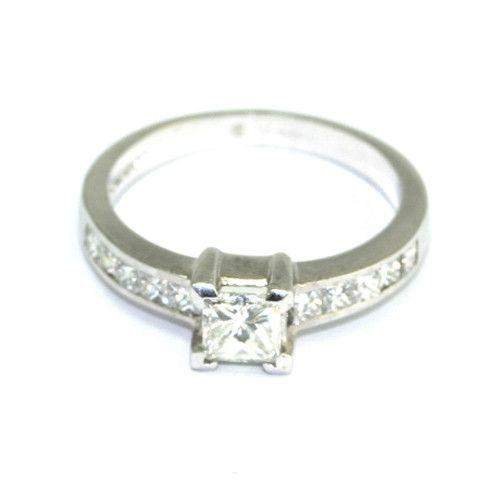 Silver engagement ring with squarecut diamond and side stones