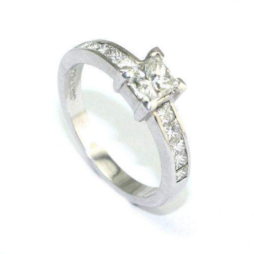 Silver engagement ring with squarecut diamond and diamond band