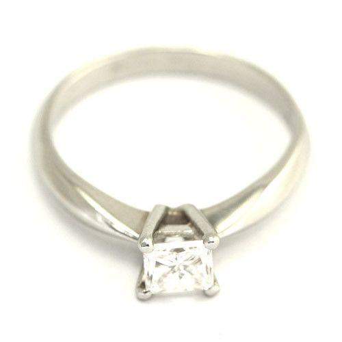 Silver engagement ring with squarecut diamond in prong setting