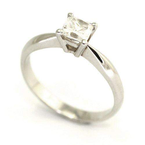 Silver engagement ring with squarecut diamond in prong setting