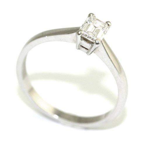Silver engagement ring with a rectangular solitaire diamond