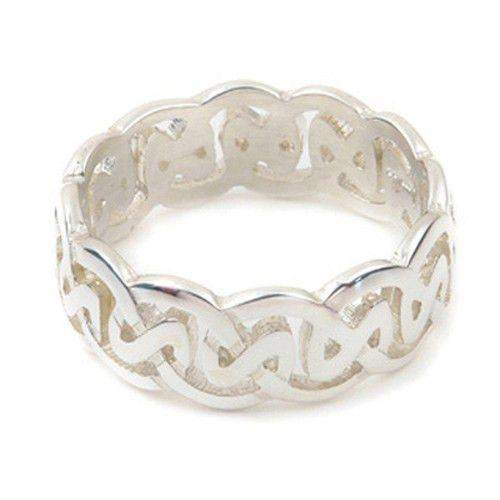 Silver ring with Celtic knot pattern and polished finish